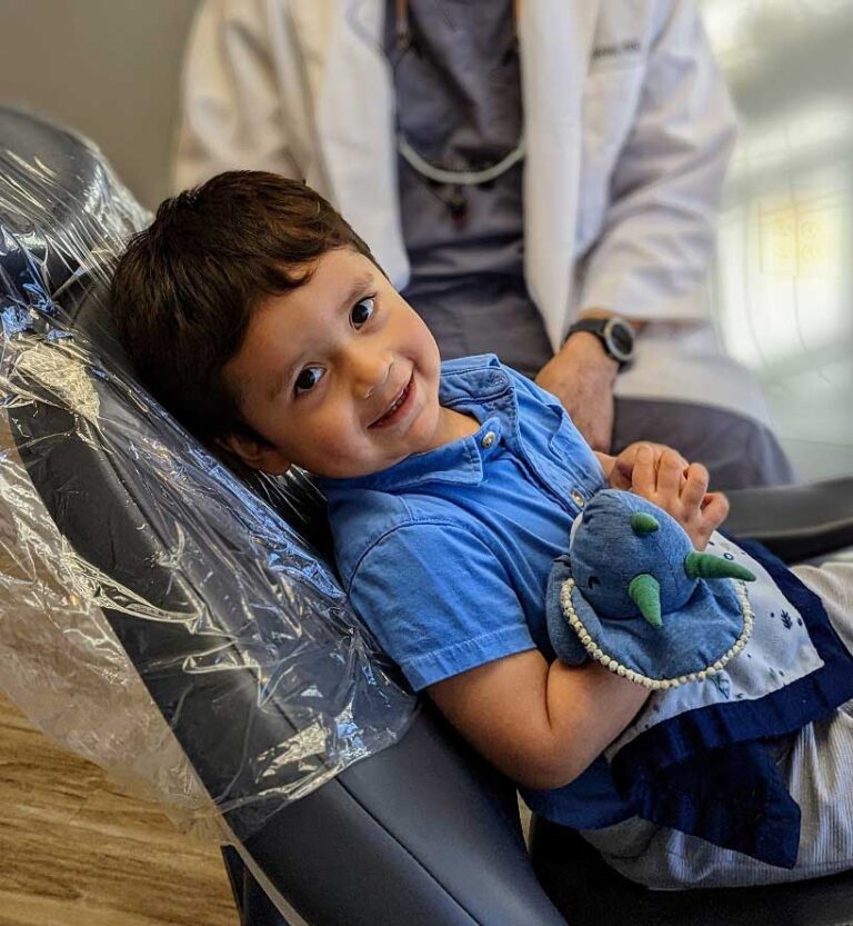 Happy child in dental chair