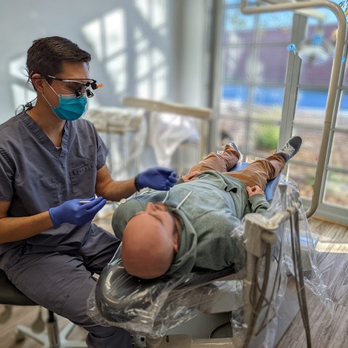 Dentist in chair ready for cleaning